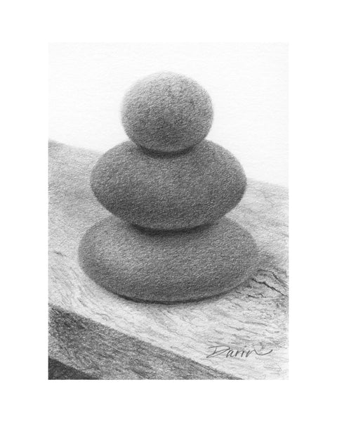 A black and white graphite drawing of three stacked rounded stones, as a cairn, on a wood surface, with a visible artist signature ‘Darin’ near the bottom right, with a wide white border.