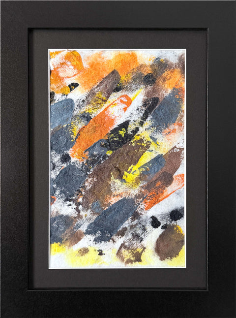 Abstract textured painting with layered brush and palette-knife strokes in orange, yellow, black, gray, and brown on a white background; matted and framed in black.