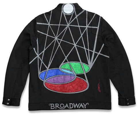 Black jacket with a geometric design painted on the back, featuring intersecting gray lines, overlapping red, green, blue, and purple ovals, the word BROADWAY painted at the bottom; signed Darin lower-right.