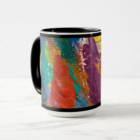 White ceramic coffee mug with a black handle and black interior, featuring a wrap‑around print of the artwork titled “Creative Palette.“