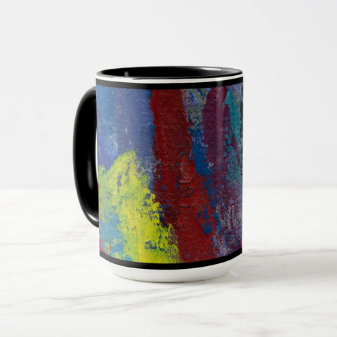White ceramic coffee mug with a black handle and black interior, featuring a wrap‑around print of the artwork titled “Downtown Palette.“