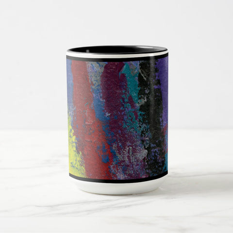 White ceramic coffee mug with a black handle and black interior, featuring a wrap‑around print of the artwork titled “Downtown Palette.“