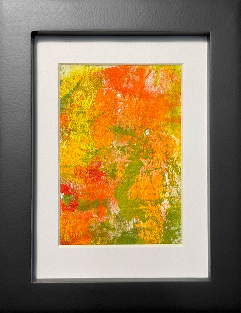 Abstract textured painting with layered brush and palette-knife strokes in orange, yellow, and green; matted in white and framed in black.