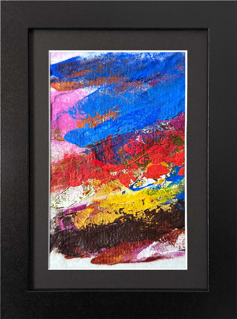 Abstract textured painting with layered brush and palette-knife strokes in blue, red, pink, yellow, brown, and white; matted and framed in black.