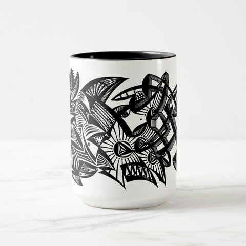 White ceramic coffee mug with a black handle and black interior, featuring a wrap‑around print of the artwork titled “Lookin’ Shark.“