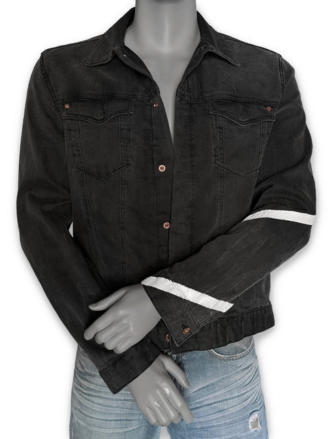 A black washed denim jacket with white stripe accents on the sleeves, displayed on a gray mannequin torso paired with light blue jeans against a white background.