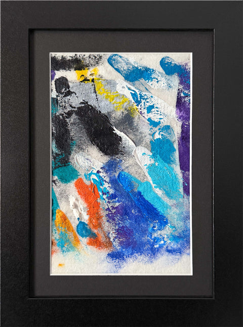 Abstract textured painting with layered brush and palette-knife strokes in blue, black, white, purple, orange, and yellow; matted and framed in black.