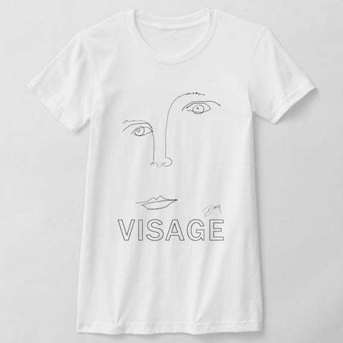A white short-sleeve T‑shirt featuring an abstract face of overlapping facial features, of the artwork: Visage, and its title below