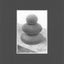 A black and white graphite drawing of three stacked rounded stones, as a cairn, on a wood surface, with a visible artist signature ‘Darin’ near the bottom right, matted in charcoal-gray.