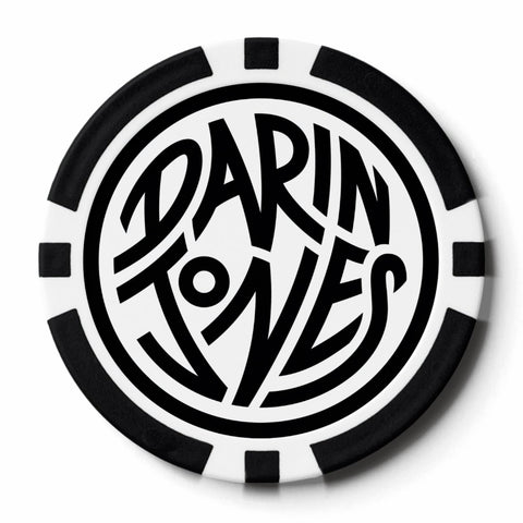 A circular stylized logo of 'DARIN JONES' in bold black lettering on a white background within a black-and-white-rimmed poker chip.