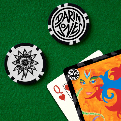 Two poker chips, one featuring the 'DARIN JONES' logo side and the artwork side 'Flowerize,' with fanned playing cards of a Queen of hearts and artwork 'Passion' arranged on a green felt surface.
