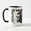 White ceramic coffee mug with a black handle and black interior, featuring a wrap‑around print of the artwork titled “Burnin’ Urchin.“