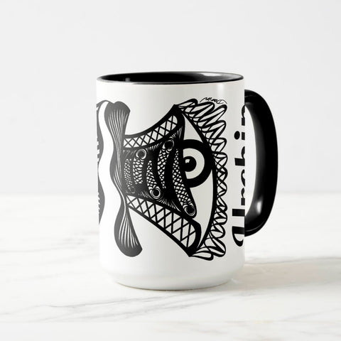 White ceramic coffee mug with a black handle and black interior, featuring a wrap‑around print of the artwork titled “Burnin’ Urchin.“
