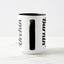 White ceramic coffee mug with a black handle and black interior, featuring a wrap‑around print of the artwork titled “Burnin’ Urchin.“