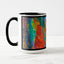 White ceramic coffee mug with a black handle and black interior, featuring a wrap‑around print of the artwork titled “Creative Palette.“