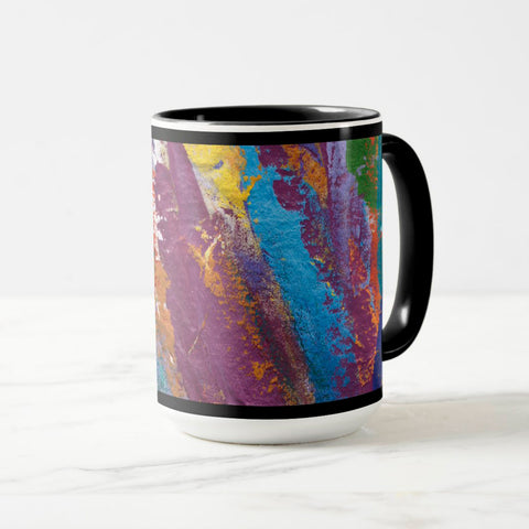 White ceramic coffee mug with a black handle and black interior, featuring a wrap‑around print of the artwork titled “Creative Palette.“