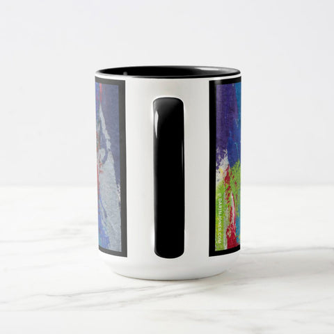 White ceramic coffee mug with a black handle and black interior, featuring a wrap‑around print of the artwork titled “Downtown Palette.“