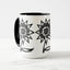 White ceramic coffee mug with a black handle and black interior, featuring a wrap‑around print of the artwork titled “Flowerize.“