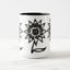 White ceramic coffee mug with a black handle and black interior, featuring a wrap‑around print of the artwork titled “Flowerize.“