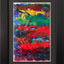 Abstract textured painting with layered brush and palette-knife strokes in red, green, blue, purple, yellow, and brown; matted and framed in black.
