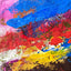 Abstract textured painting with layered brush and palette-knife strokes in blue, red, pink, yellow, brown, and white.