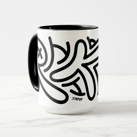 White ceramic coffee mug with a black handle and black interior, featuring a wrap‑around print of the Obscuratype™ artwork titled ‘Keith Haring.’