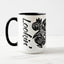 White ceramic coffee mug with a black handle and black interior, featuring a wrap‑around print of the artwork titled “Lookin’ Shark.“