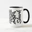 White ceramic coffee mug with a black handle and black interior, featuring a wrap‑around print of the artwork titled “Lookin’ Shark.“