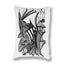 A rectangular white throw pillow featuring a black hand-drawn pen-and-ink illustration of an open-mouth creature, geometric and organic patterns.