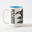 White ceramic coffee mug with a white handle and blue interior, featuring a wrap‑around print of the artwork titled “Pescados.“