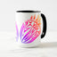 White ceramic coffee mug with a black handle and black interior, featuring a mirrored colorful gradient print of the artwork titled “Pinned.“