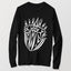A black long-sleeve crewneck t-shirt featuring a white, geometric, graphic illustration of the artwork: Pinned.