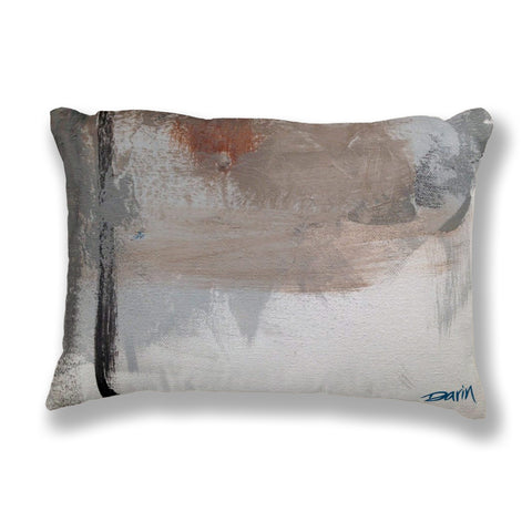 An abstract rectangular throw pillow featuring a textured painting print in shades of gray, beige, white, and a small rust-orange accent, with a black stripe along the left side and a blue ‘Darin’ signature in the bottom right corner.
