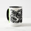 White ceramic coffee mug with a black handle and black interior, featuring a wrap‑around print of the artwork titled “Spiked.“