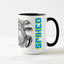 White ceramic coffee mug with a black handle and black interior, featuring a wrap‑around print of the artwork titled “Spiked.“