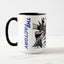 White ceramic coffee mug with a black handle and black interior, featuring a wrap‑around print of the artwork titled “The Factory.“
