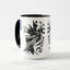 White ceramic coffee mug with a black handle and black interior, featuring a wrap‑around print of the artwork titled “The Factory.“