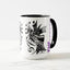 White ceramic coffee mug with a black handle and black interior, featuring a wrap‑around print of the artwork titled “The Factory.“