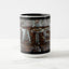 A white ceramic coffee mug with a black handle and black interior, featuring the ‘ATE’ section of a wrap-around photographic print of a wet street plate with the word ‘WATER’. 